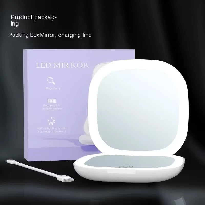 "Glow & Go™️ Portable Vanity Mirror – Compact, Foldable with LEDs & 2× Magnification"